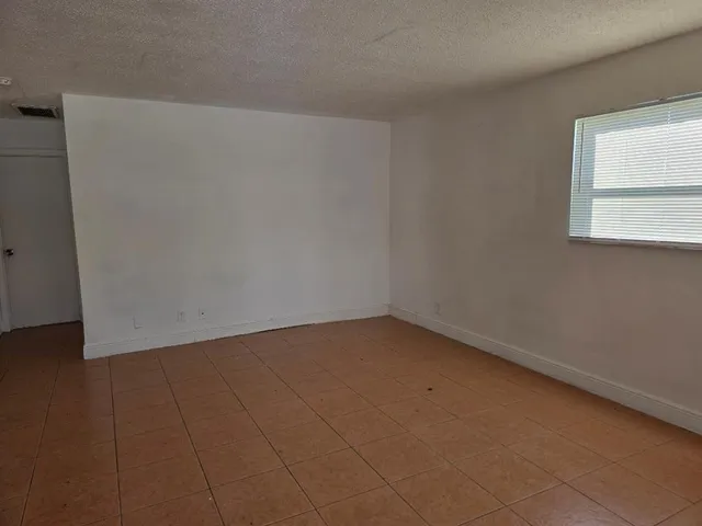 a view of a room with an empty room