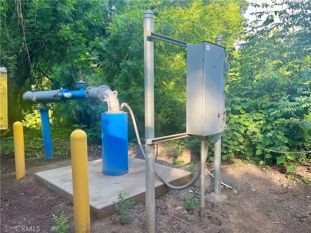 0 Oak Way Chico, CA 95973 - Photo 4 of 6 a backyard of a house with fountain table and chairs