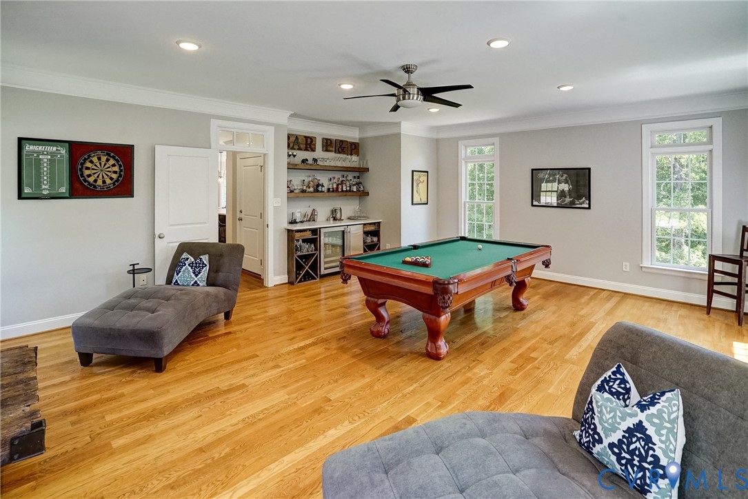 1295 Hermitage Road Manakin-Sabot, VA 23103 - Photo 37 of 55 a living room with furniture and a table