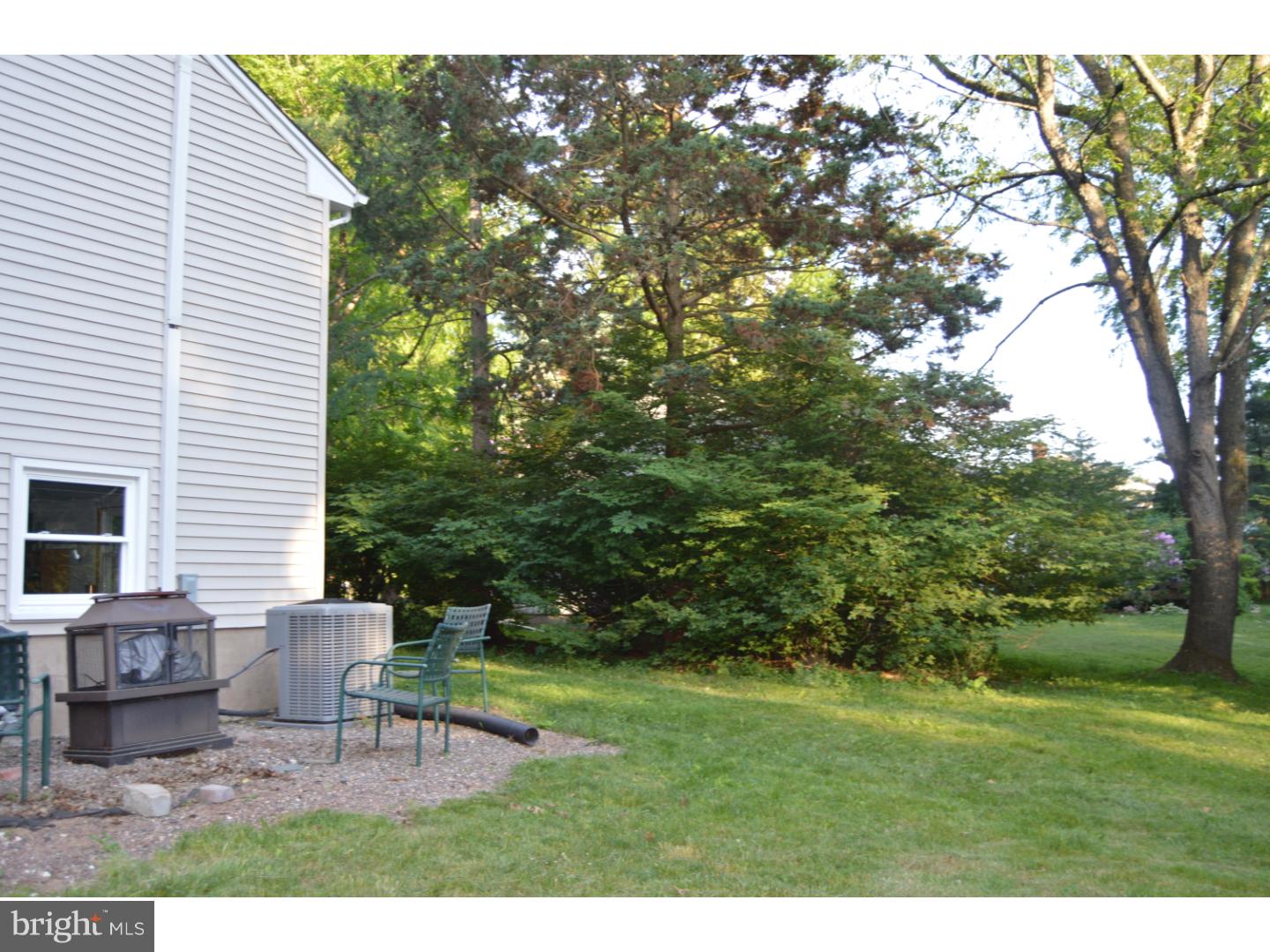 16 Dublin Road Pennington, NJ 08534 - Photo 16 of 19 a view of a house with a yard and sitting area