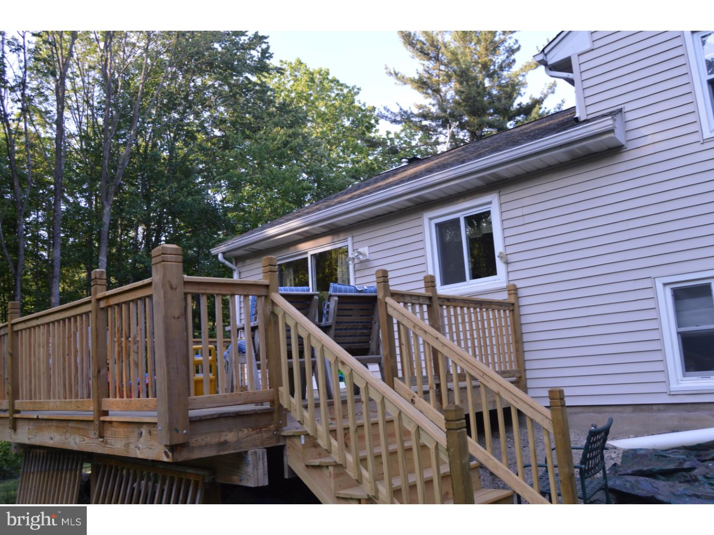 16 Dublin Road Pennington, NJ 08534 - Photo 17 of 19 a view of deck with a wooden fence