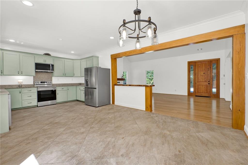 2794 Cleburne Parkway Powder Springs, GA 30127 - Photo 16 of 49 a view of a kitchen with a sink and cabinets