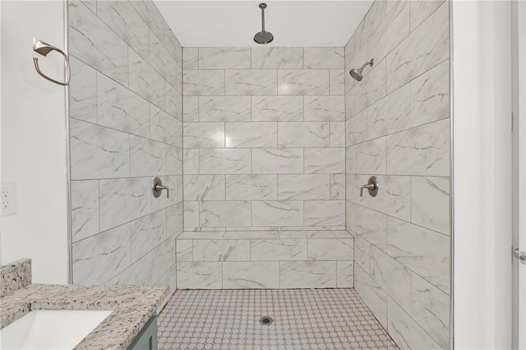 2794 Cleburne Parkway Powder Springs, GA 30127 - Photo 26 of 49 a bathroom with a shower