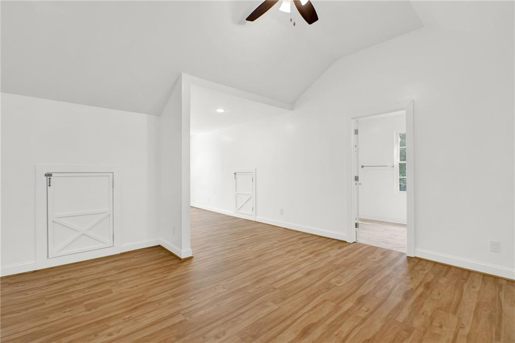 2794 Cleburne Parkway Powder Springs, GA 30127 - Photo 36 of 49 wooden floor in an empty room