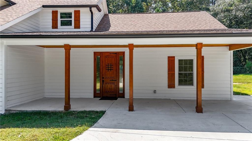 2794 Cleburne Parkway Powder Springs, GA 30127 - Photo 4 of 49 a view of front door and small yard