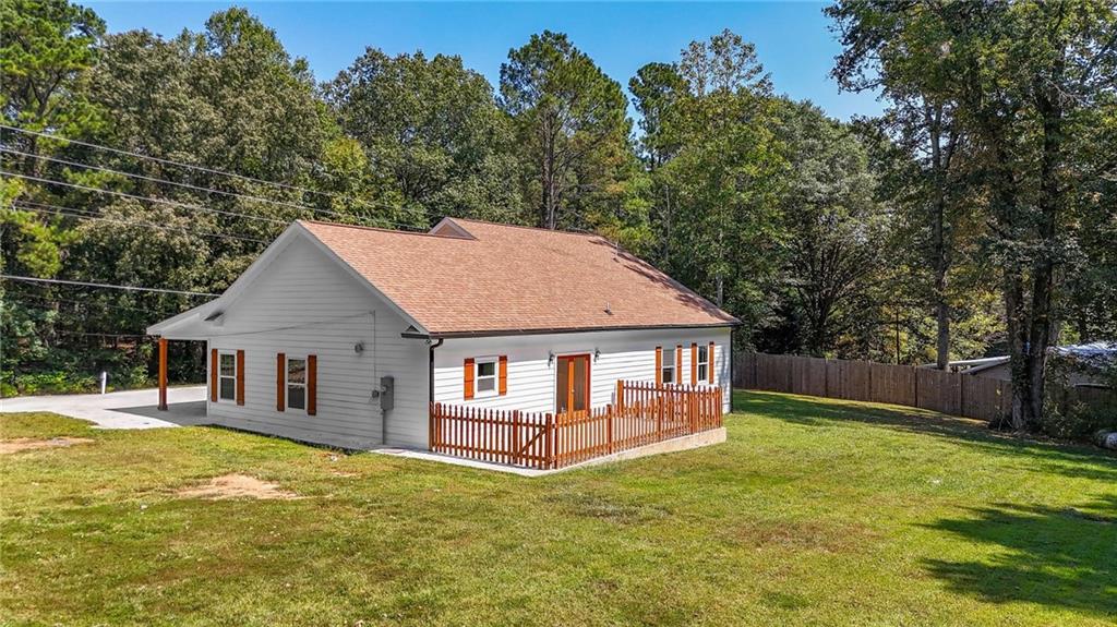 2794 Cleburne Parkway Powder Springs, GA 30127 - Photo 42 of 49 a house with swimming pool in front of it