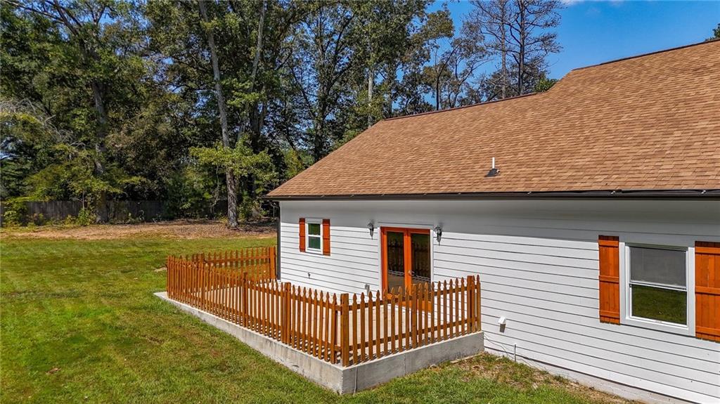 2794 Cleburne Parkway Powder Springs, GA 30127 - Photo 43 of 49 a view of a house with a yard