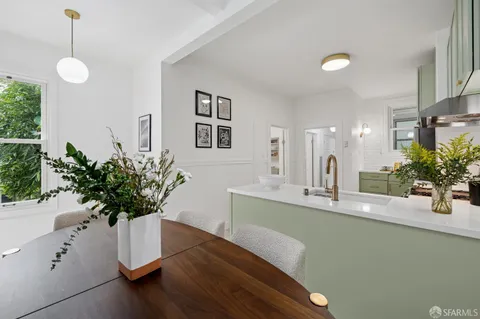 a vase of flowers sitting on a table