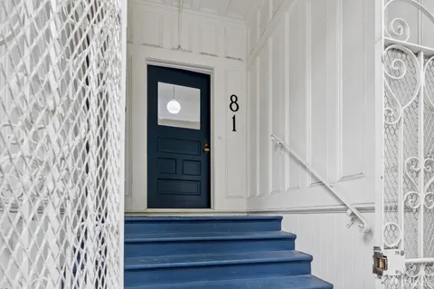 a view of entryway with wooden floor