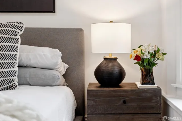 a view of a couch in wooden floor
