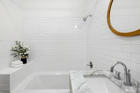 a bathroom with a sink and a bathtub