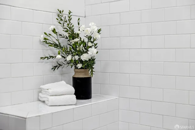a potted plant sitting on a bathroom