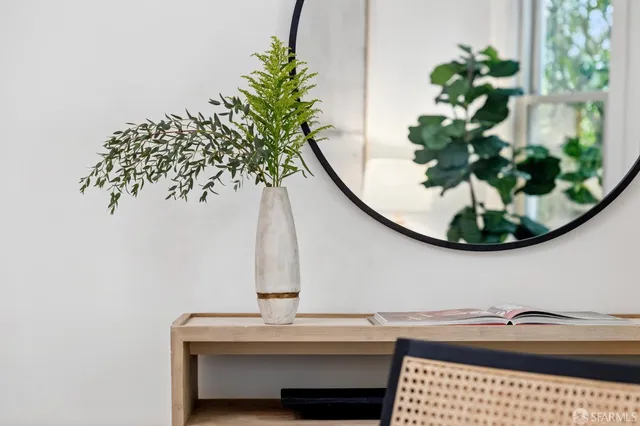 a vase of flowers sitting on a table