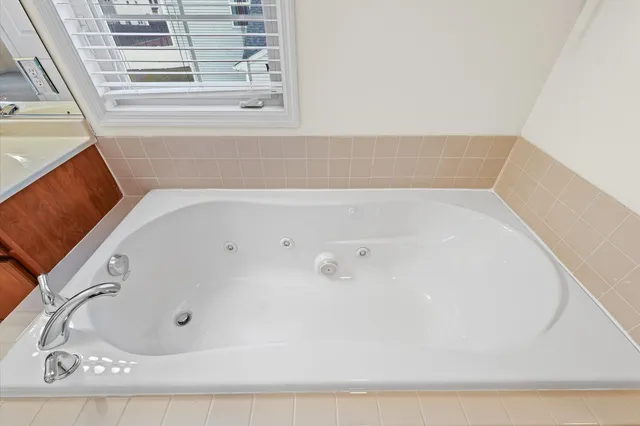 a bathroom with bathtub