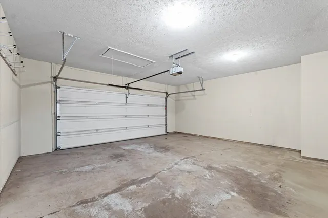 a view of a room with storage and utility room