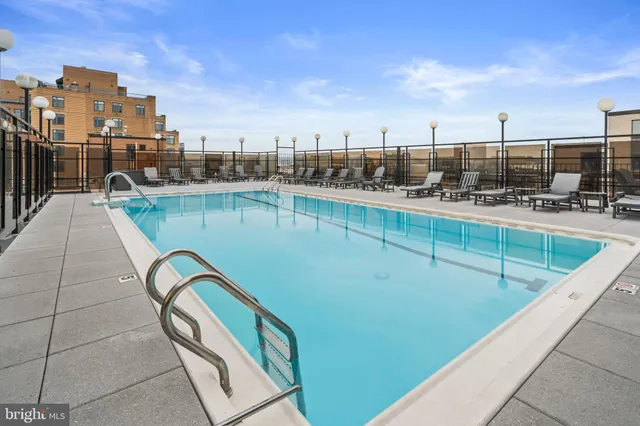 a view of a swimming pool with a terrace