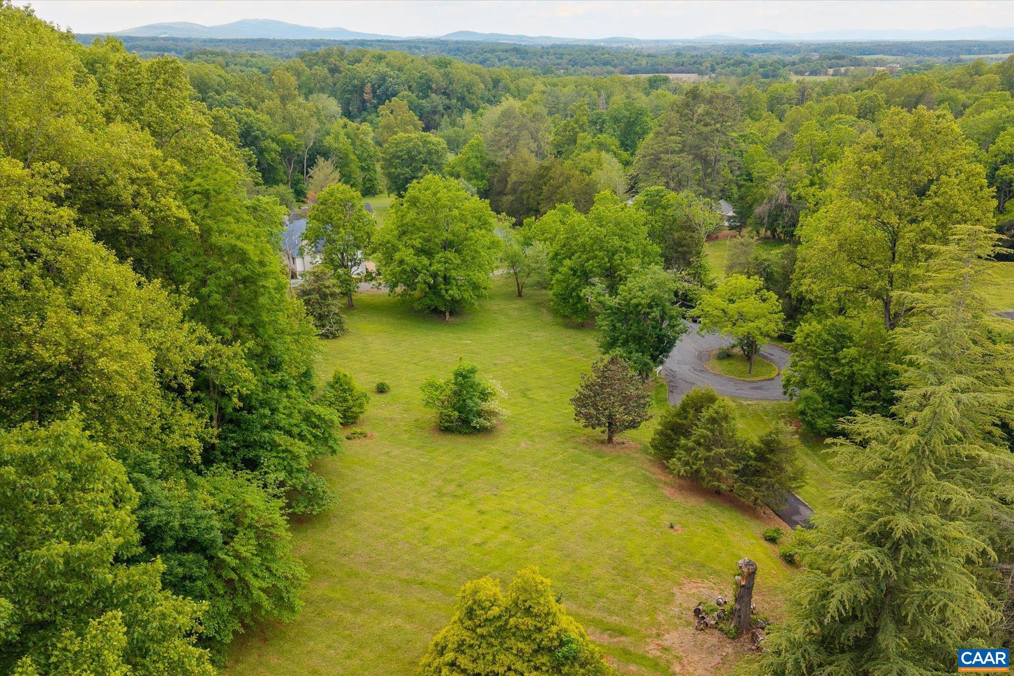 13320 Hackberry Road Orange, VA 22960 - Photo 41 of 47 a view of a lake with a mountain in the background