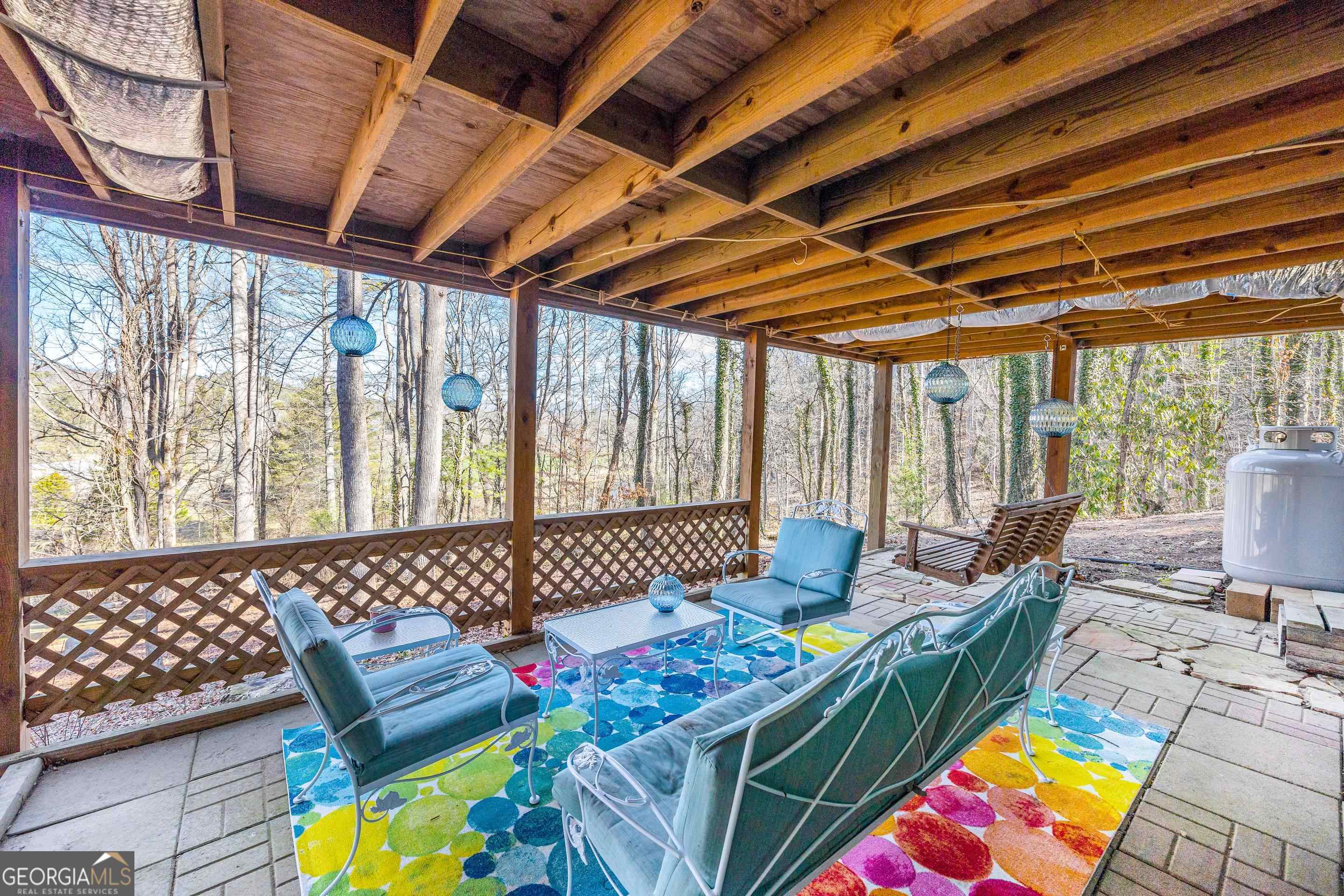 153 Coleman Heights Lane Rabun Gap, GA 30568 - Photo 11 of 57 a outdoor living space with furniture