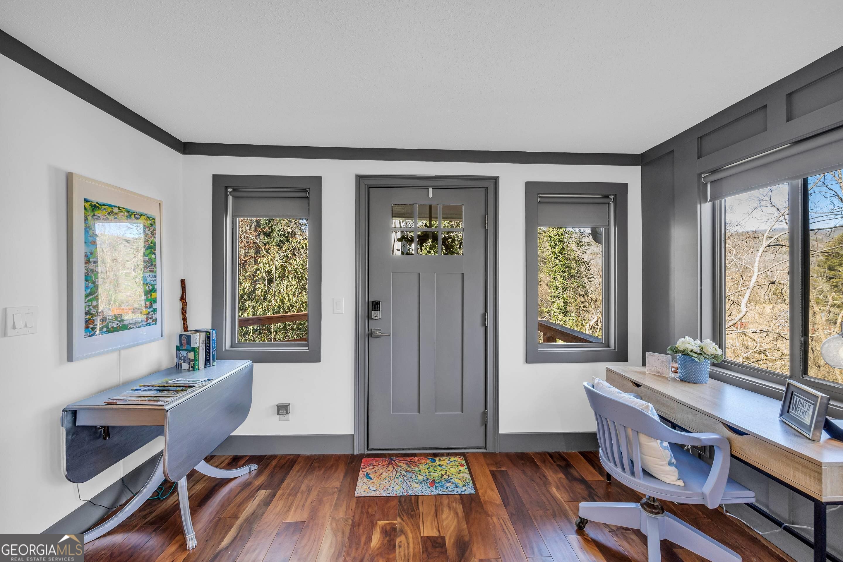 153 Coleman Heights Lane Rabun Gap, GA 30568 - Photo 25 of 57 a workspace with wooden floor and a window
