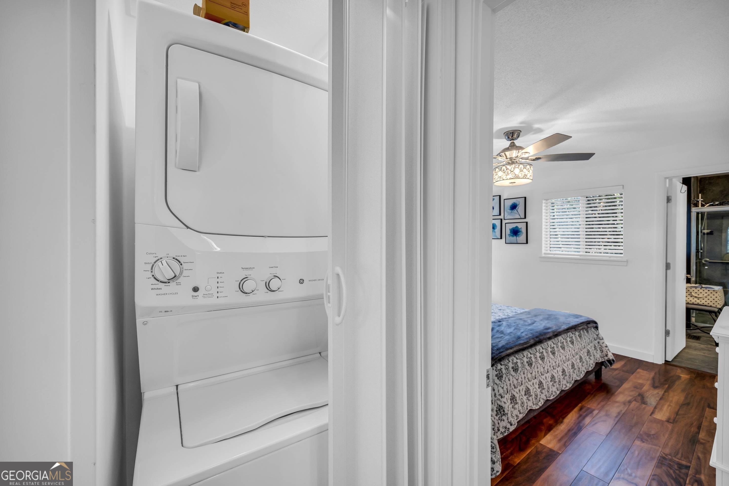 153 Coleman Heights Lane Rabun Gap, GA 30568 - Photo 29 of 57 a room with a walk in closet and wooden floor