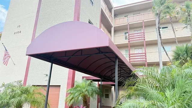 a view of balcony with potted plants