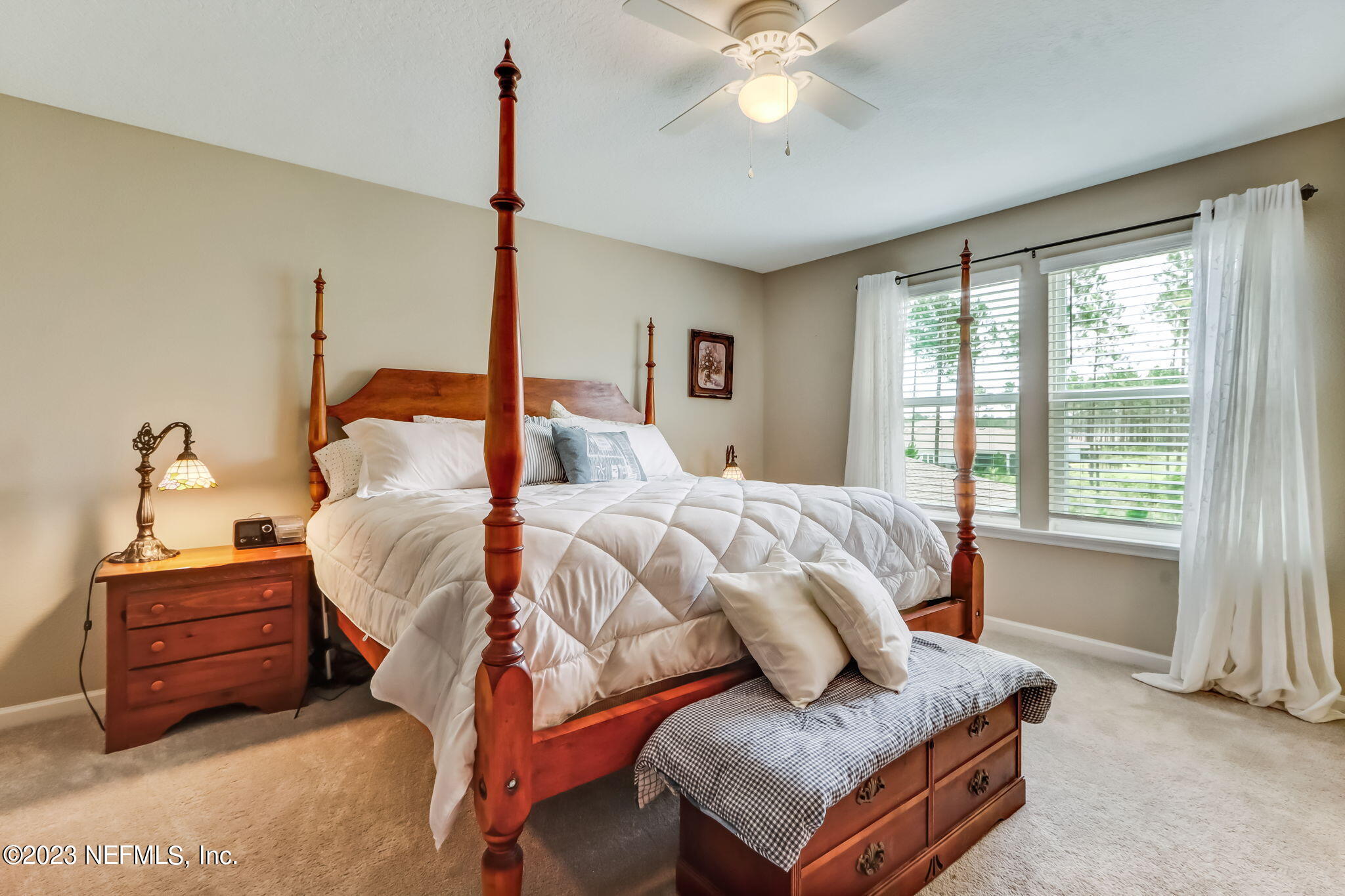 75764 Spoonbill Lane Yulee, FL 32097 - Photo 13 of 34 a bedroom with bed and window
