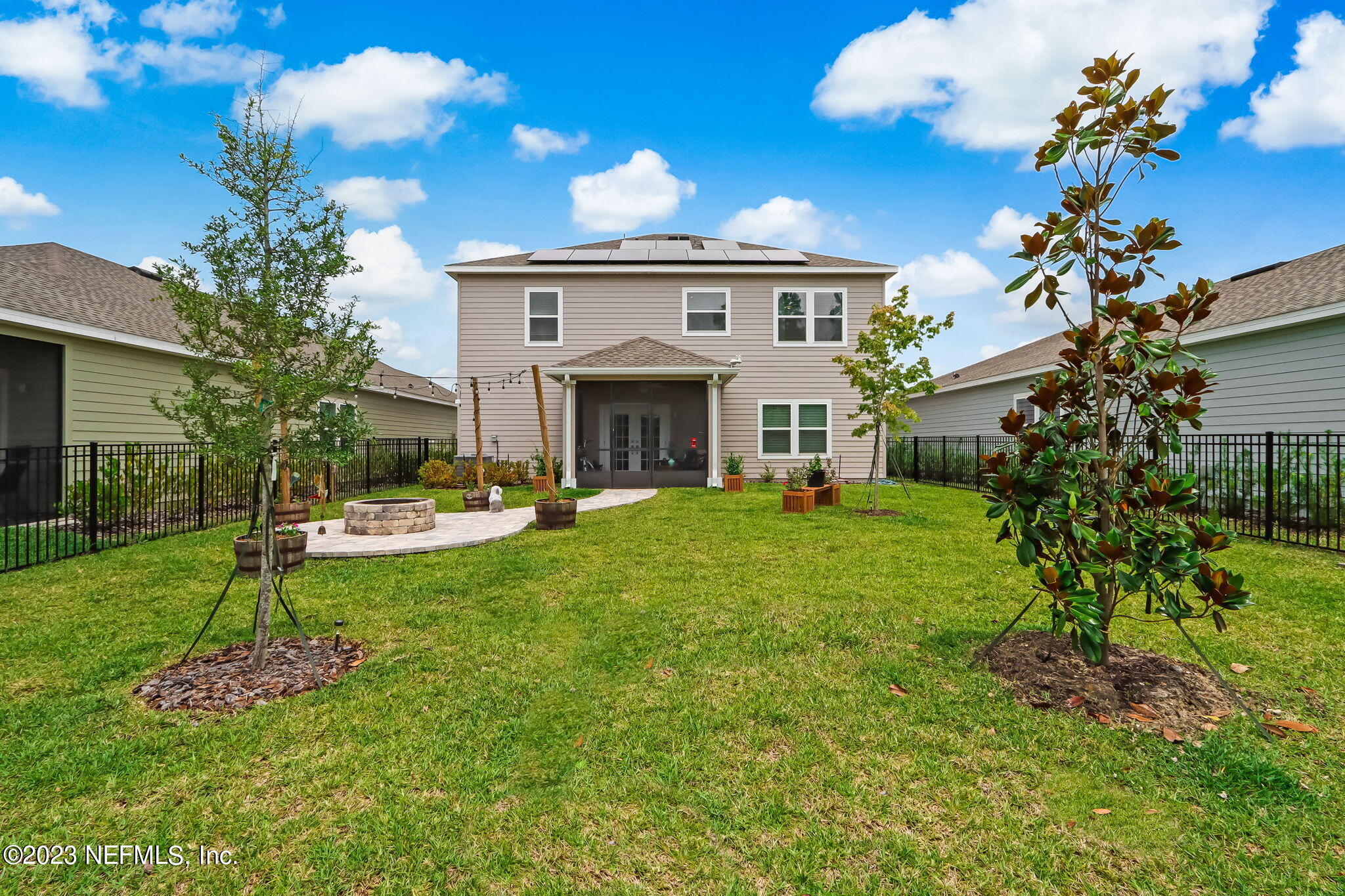 75764 Spoonbill Lane Yulee, FL 32097 - Photo 24 of 34 a front view of a house with garden