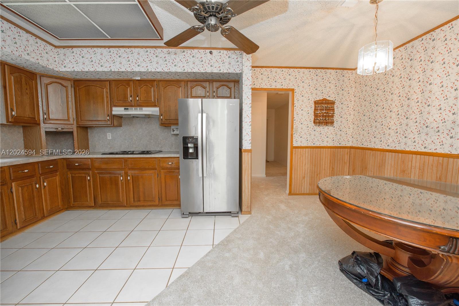 17355 Southwest 256th Street Homestead, FL 33031 - Photo 19 of 32 a bathroom with a tub a sink and a mirror