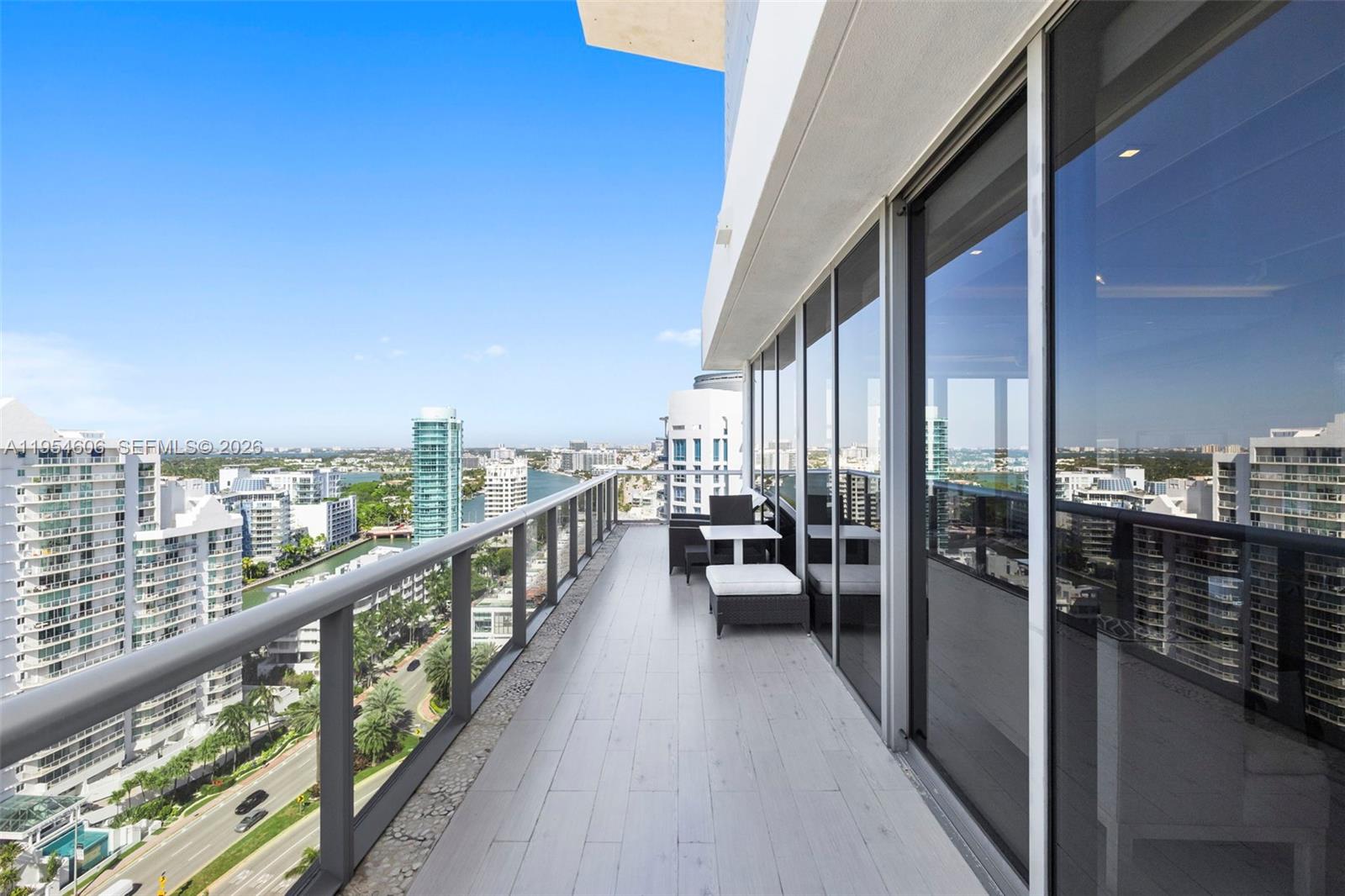 5875 Collins Avenue, Unit PH7 Miami Beach, FL 33140 - Photo 31 of 49 a view of city from balcony