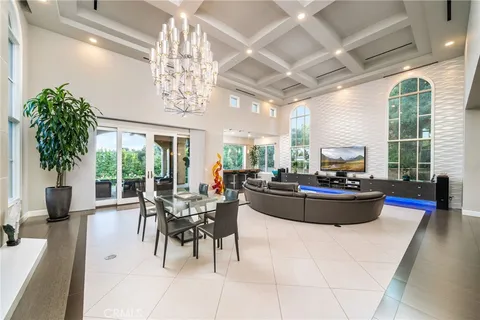 a kitchen with wooden cabinets a sink and a window