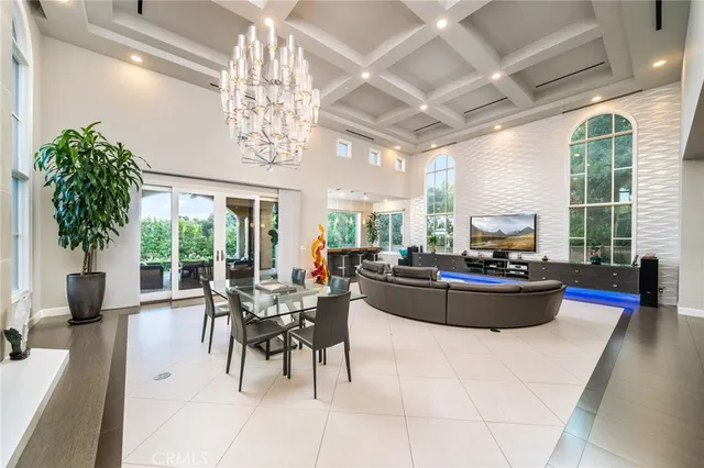 a kitchen with wooden cabinets a sink and a window