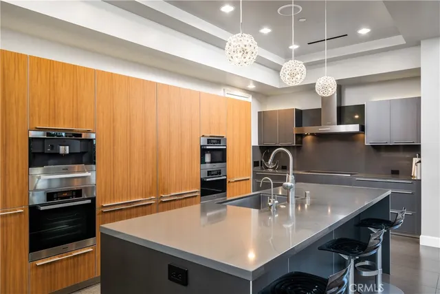 a bathroom with a double vanity sink mirror and shower