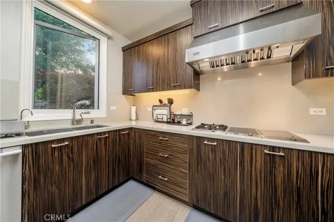 a bedroom with a large bed and a large window