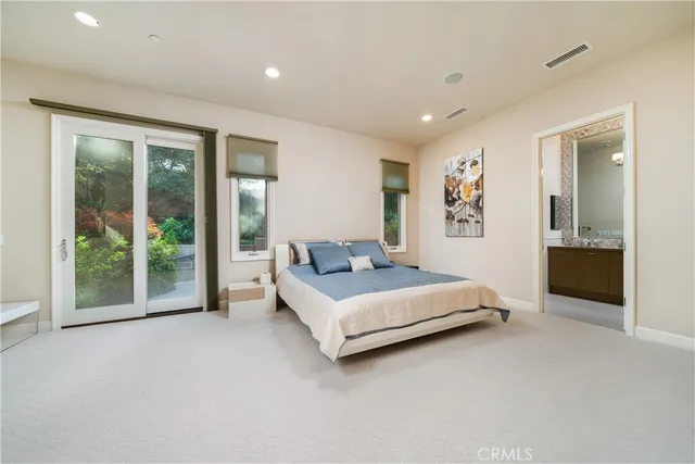 a bathroom with a tub and shower