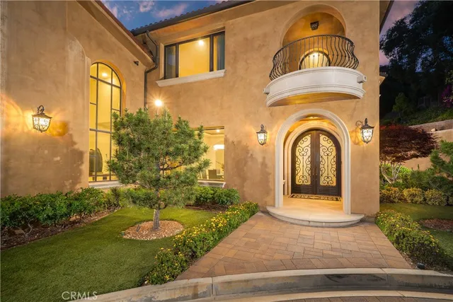 a view of a swimming pool and lake in the back
