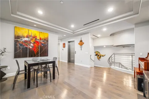 a view of a swimming pool with an outdoor space and seating area