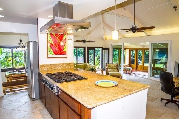 4200 Omao Road Koloa, HI 96756 - Photo 11 of 19 a kitchen that has a lot of cabinets in it