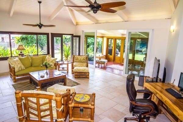 4200 Omao Road Koloa, HI 96756 - Photo 5 of 19 a living room with furniture and a large window