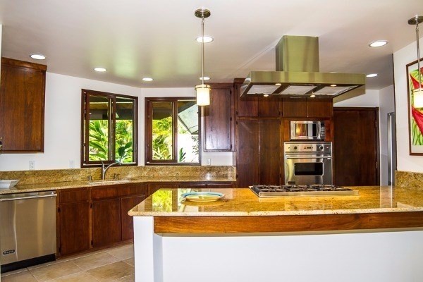 4200 Omao Road Koloa, HI 96756 - Photo 9 of 19 a view of a kitchen with a sink and living room