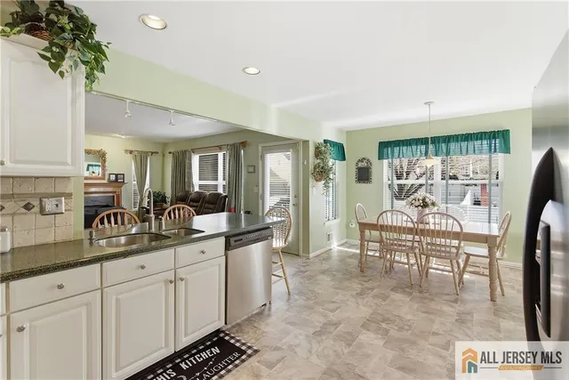 a bedroom with a bed and a cabinets