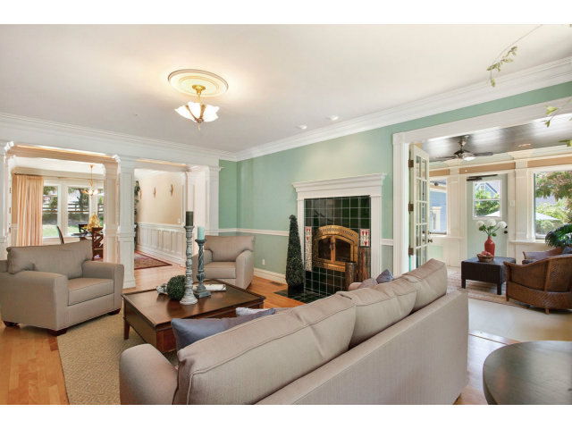 29551 Palomares Road Castro Valley, CA 94552 - Photo 12 of 25 a living room with furniture fireplace and a large window