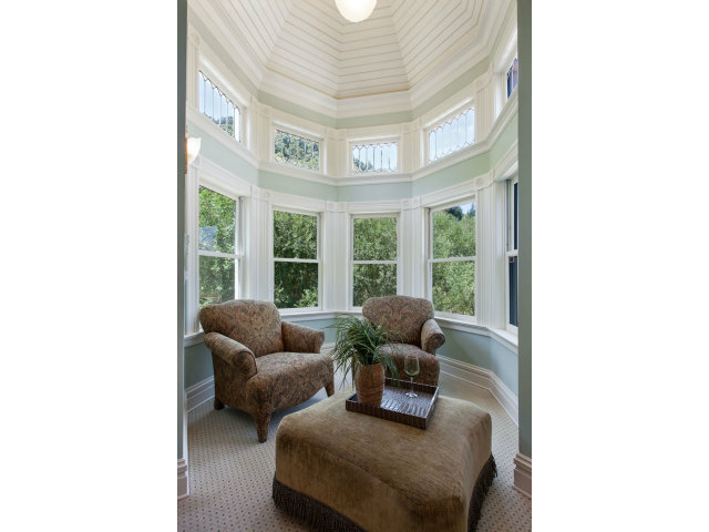 29551 Palomares Road Castro Valley, CA 94552 - Photo 17 of 25 a living room with furniture and a floor to ceiling window