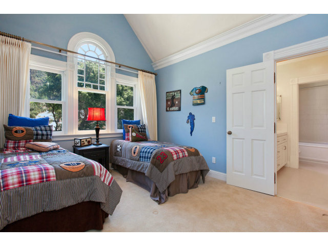 29551 Palomares Road Castro Valley, CA 94552 - Photo 18 of 25 a bedroom with bed and window