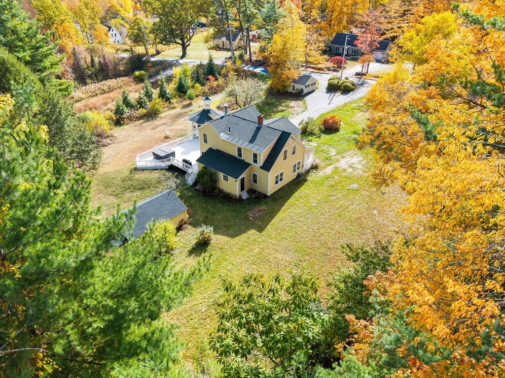 840 Fisher Road Fitchburg, MA 01420 - Photo 37 of 42 a backyard of a house with a large tree