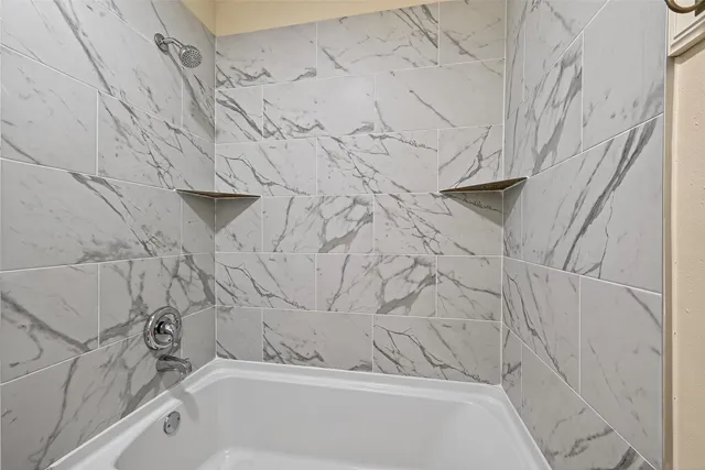 a bathroom with a bathtub