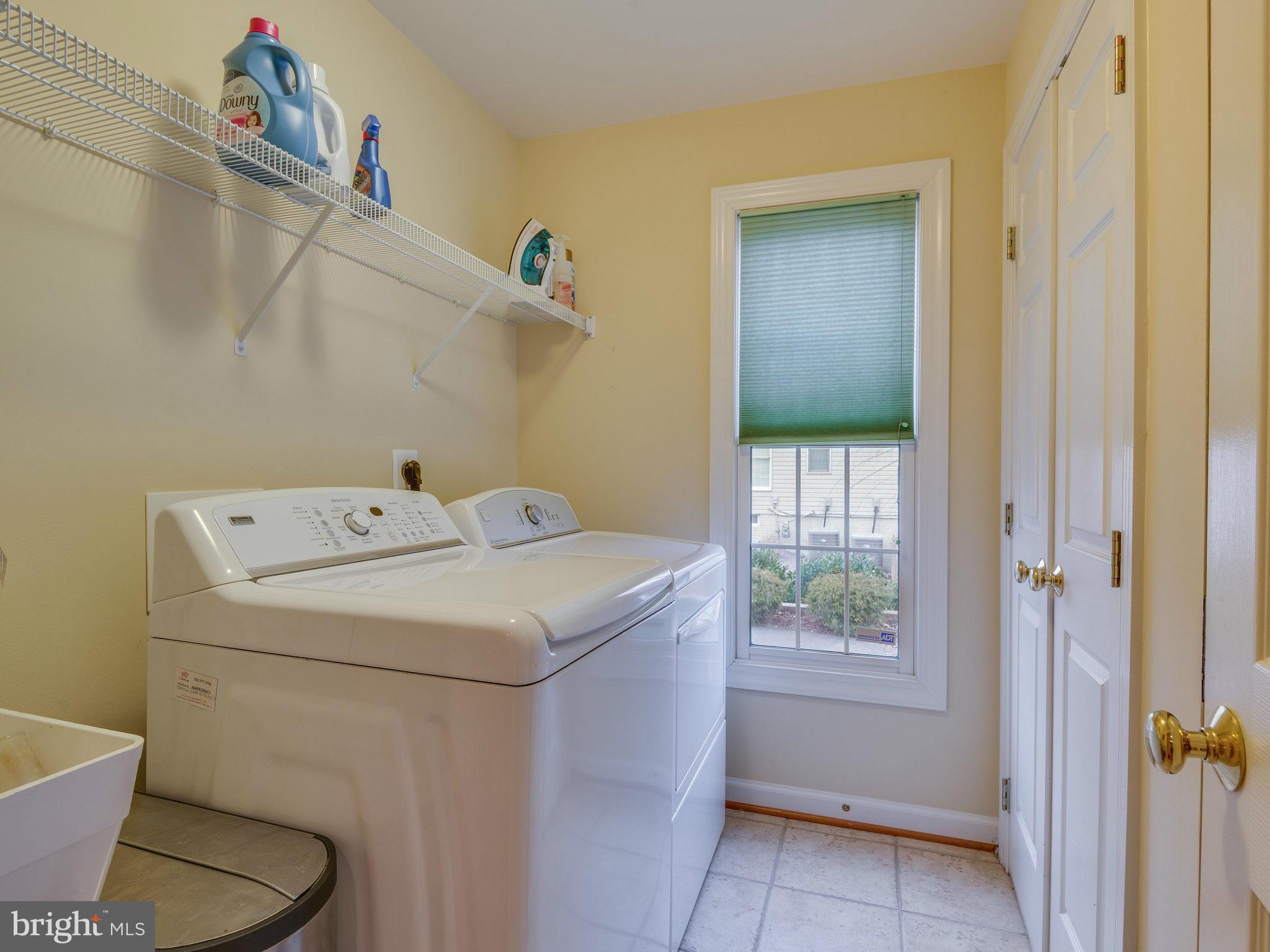22570 Forest Manor Drive Ashburn, VA 20148 - Photo 21 of 30 a utility room with dryer and washer