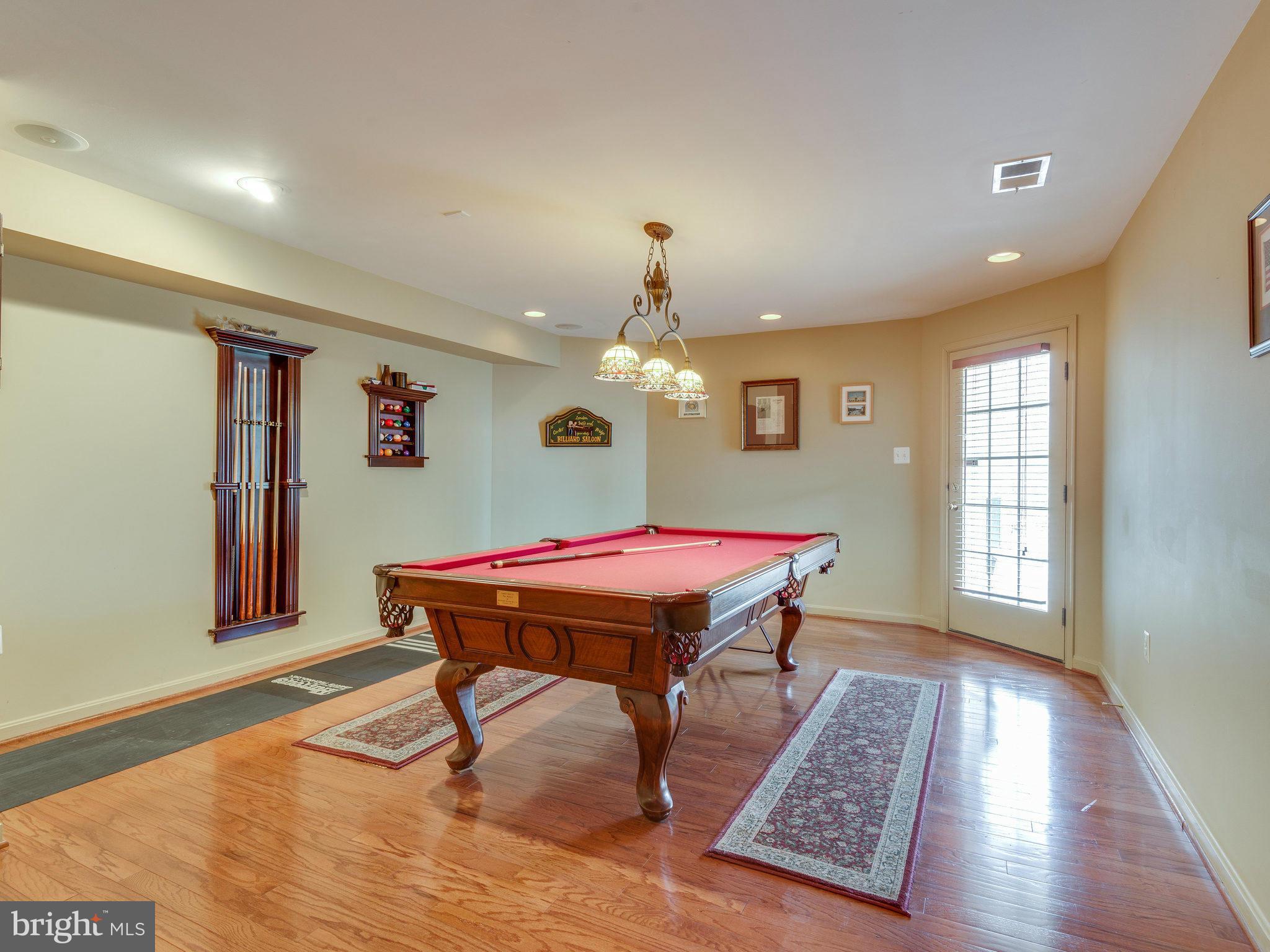 22570 Forest Manor Drive Ashburn, VA 20148 - Photo 25 of 30 a room with furniture pool table and window