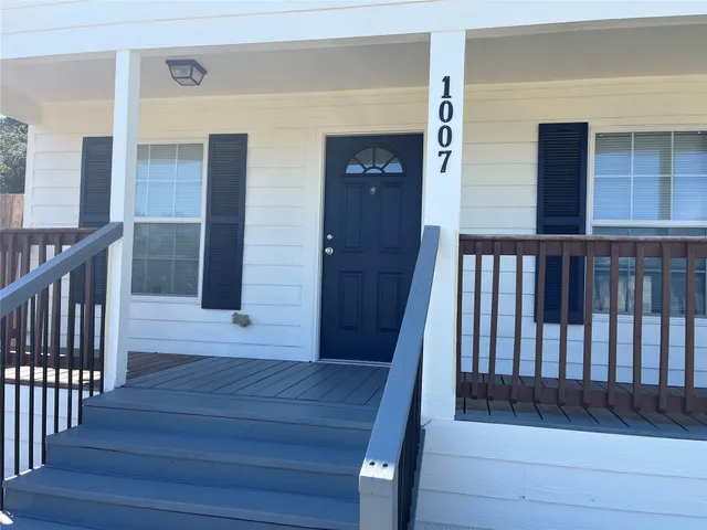 a view of a house with a patio