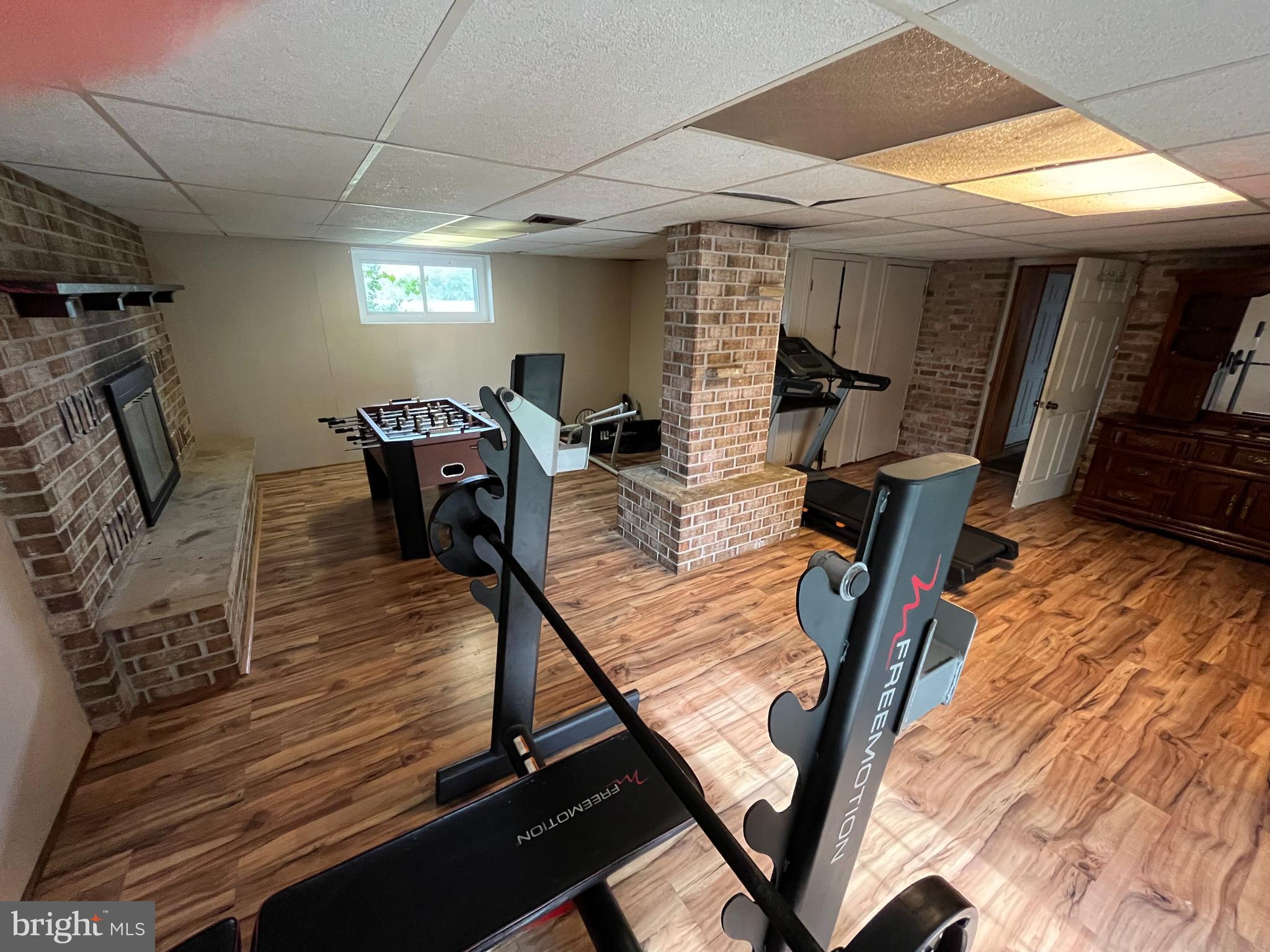 11015 Mexico Farm Road Southeast Cumberland, MD 21502 - Photo 18 of 23 a view of a dining room with furniture window and wooden floor