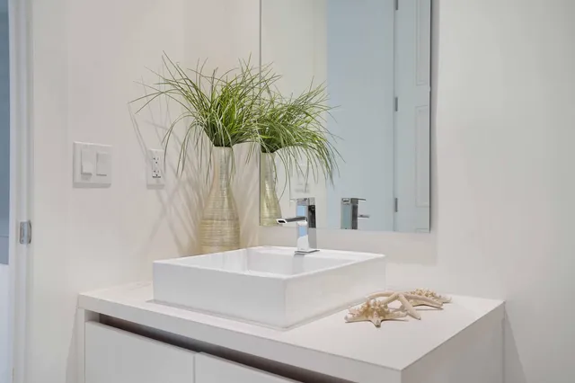 a kitchen with a sink and a stove